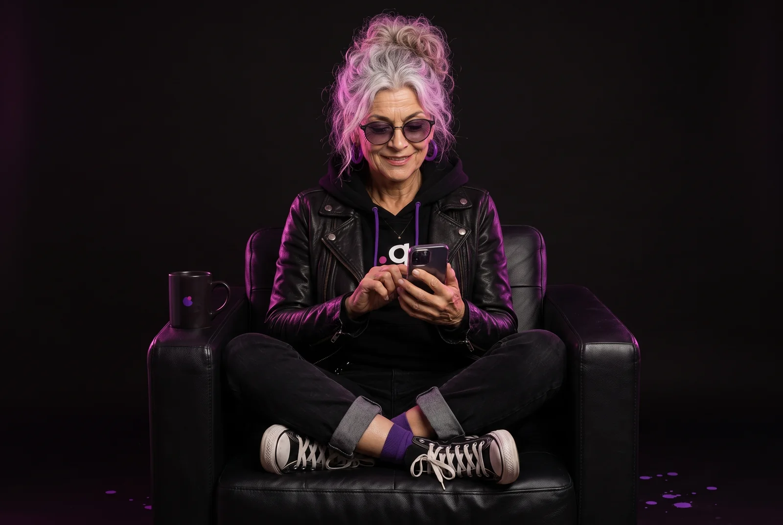 GrandMa in an armchair, answering on her phone
